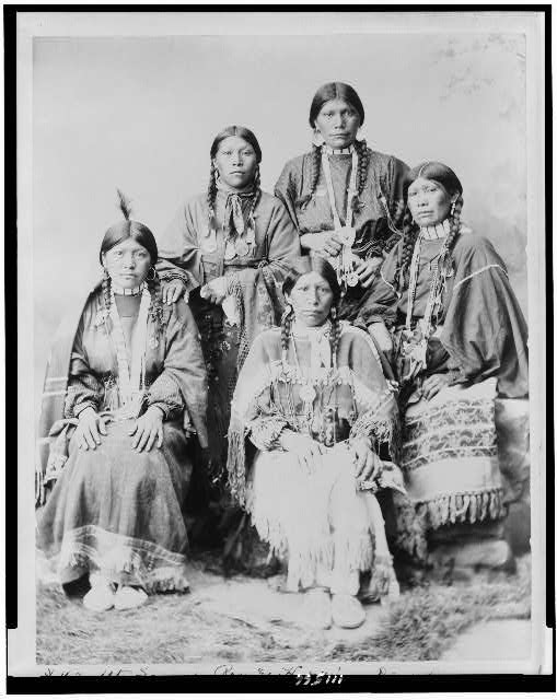 Five Ute women posed