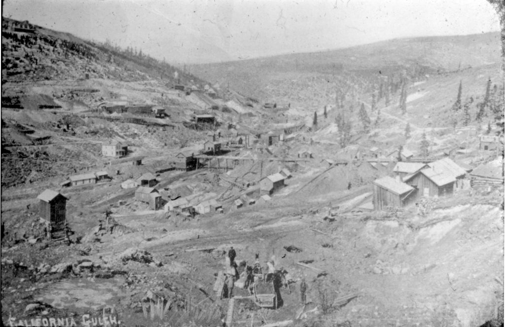 old photo of the town from sky view.