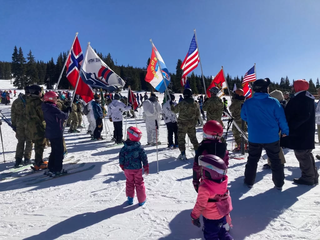 Children watching a 10th Mountain Division tribute at Ski Cooper