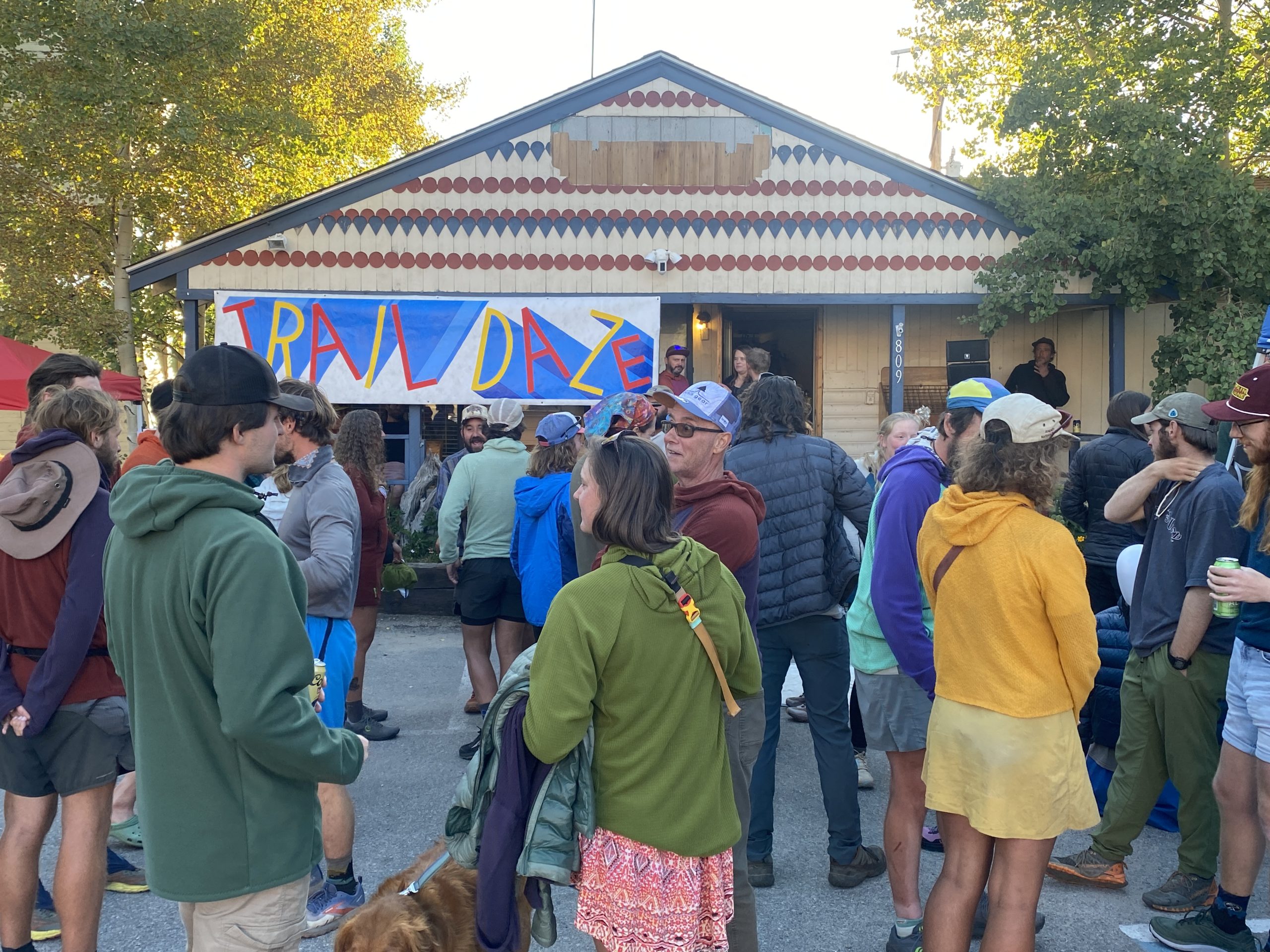 people standing outside a building.