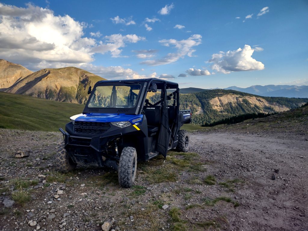 All terrain vehicle on a rode in the East Side Mining District