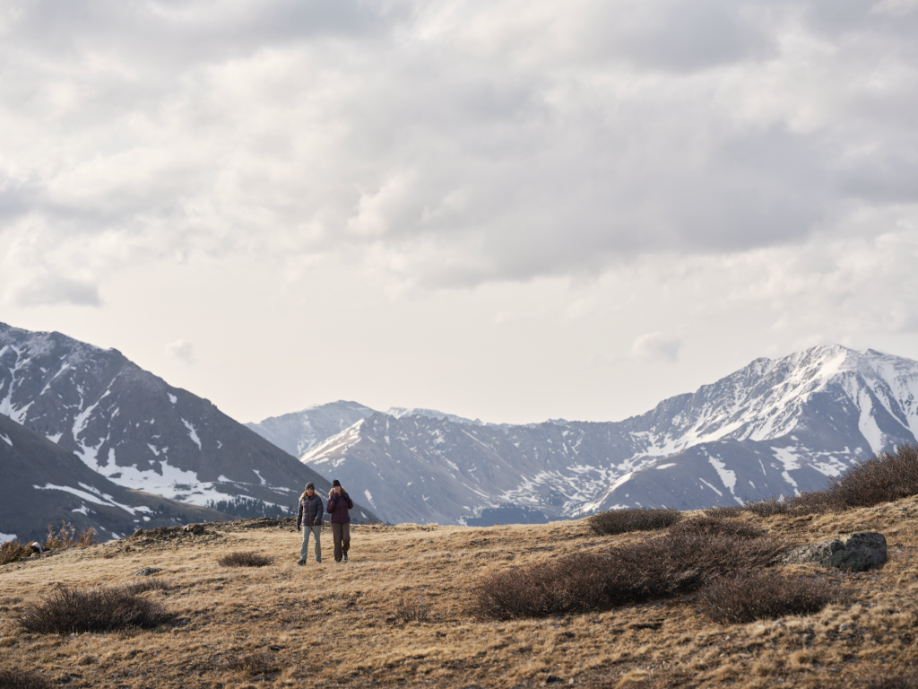 Two women hiking at the Top of the Rockies on Independence Pass on the Summit