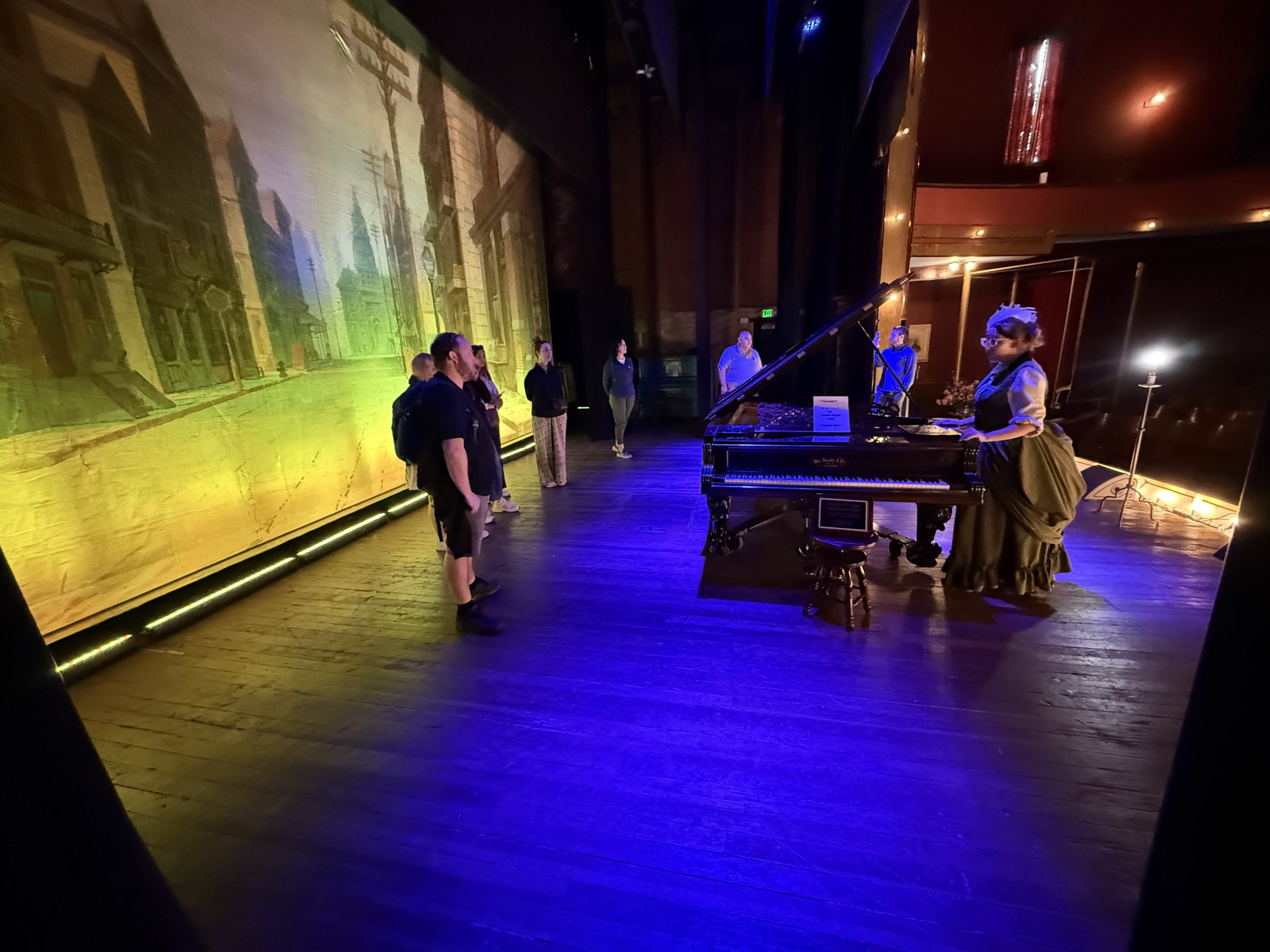 Guided tour group inside the historic Tabor Opera House in Leadville Colorado