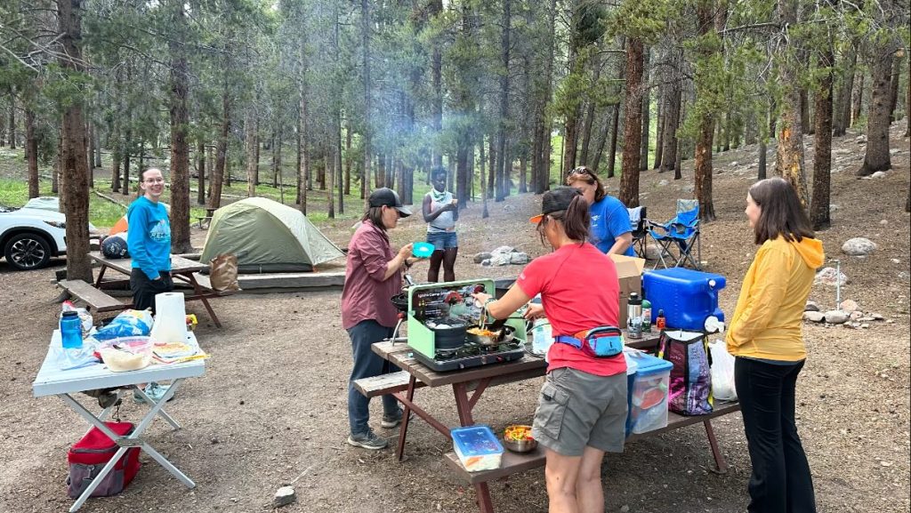 Camp stove cooking outdoors at altitude